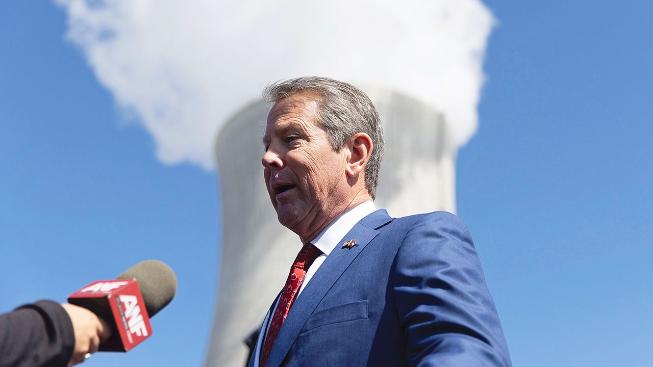 Governor Brian Kemp speaks to journalists in Waynesboro, Burke County, Georgia.