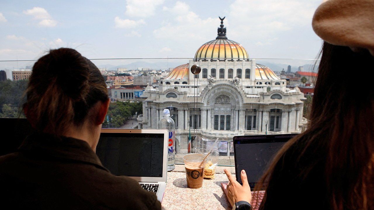 People work at the coffee shop in the downtown of Mexico City, Mexico.