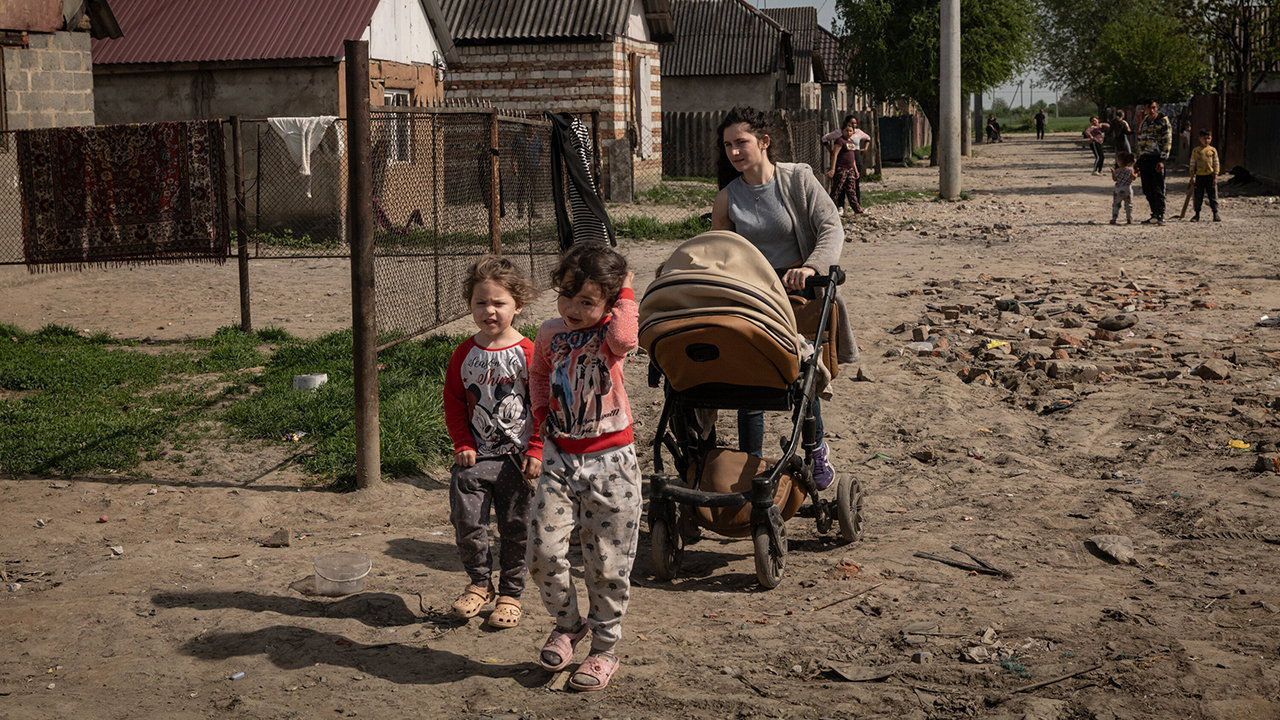 A Roma mother and her children in a village in Ukraine