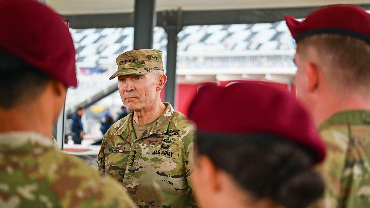 General Randy George, Chief of Staff of the Army, speaks with paratroopers from the U.S. Army.