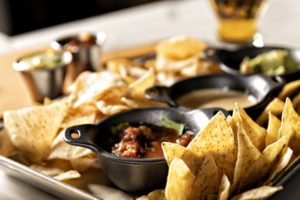 Photo of Bar Louie nachos shared for digital strategy